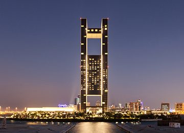 A tall beautiful building at night